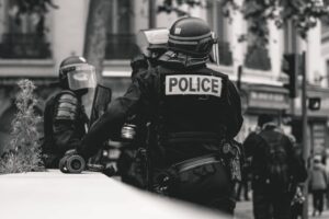 High police presence in Lyon, France, during the 25th weekend of the yellow vests movement.

Police violence is at its highest since the 1950s. There is an extensive use of tear gas, sting-ball grenades and the LBDs ("defense ball launchers") against largely peaceful protesters. The policeman holds his hand on a LBD, shown on the left in the picture. The use of LBDs is very controversial, causing serious injuries.

As of now (May 5th), 292 persons claim to be seriously injured by rubber balls, 23 persons lost an eye, 5 a hand during protests (source: mediapart.fr, http://tiny.cc/6hd85y).