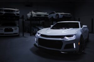 I shot this while doing a job for a luxury automotive storage facility in Baltimore, MD. I wanted to create an ominous sense of intrigue, giving the feeling of a space that was both expansive and enclosed. I enjoy the journey my eyes take from the focal point of the headlamps to the contours of the Camero’s body, and then to the backdrop of stacked automobiles.