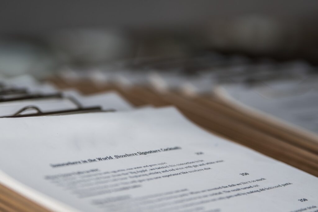restaurant menus on clipboards close up