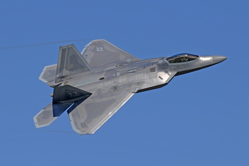 Taken April 2006.
Lockheed-Martin F22 Raptor .
Taking off while on a visit to RAF (US) Lakenheath. Eastern England.
( A ground to Air Photo.)